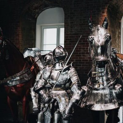 pexels ott maidre 2046779 Medieval armor display with horse in museum.